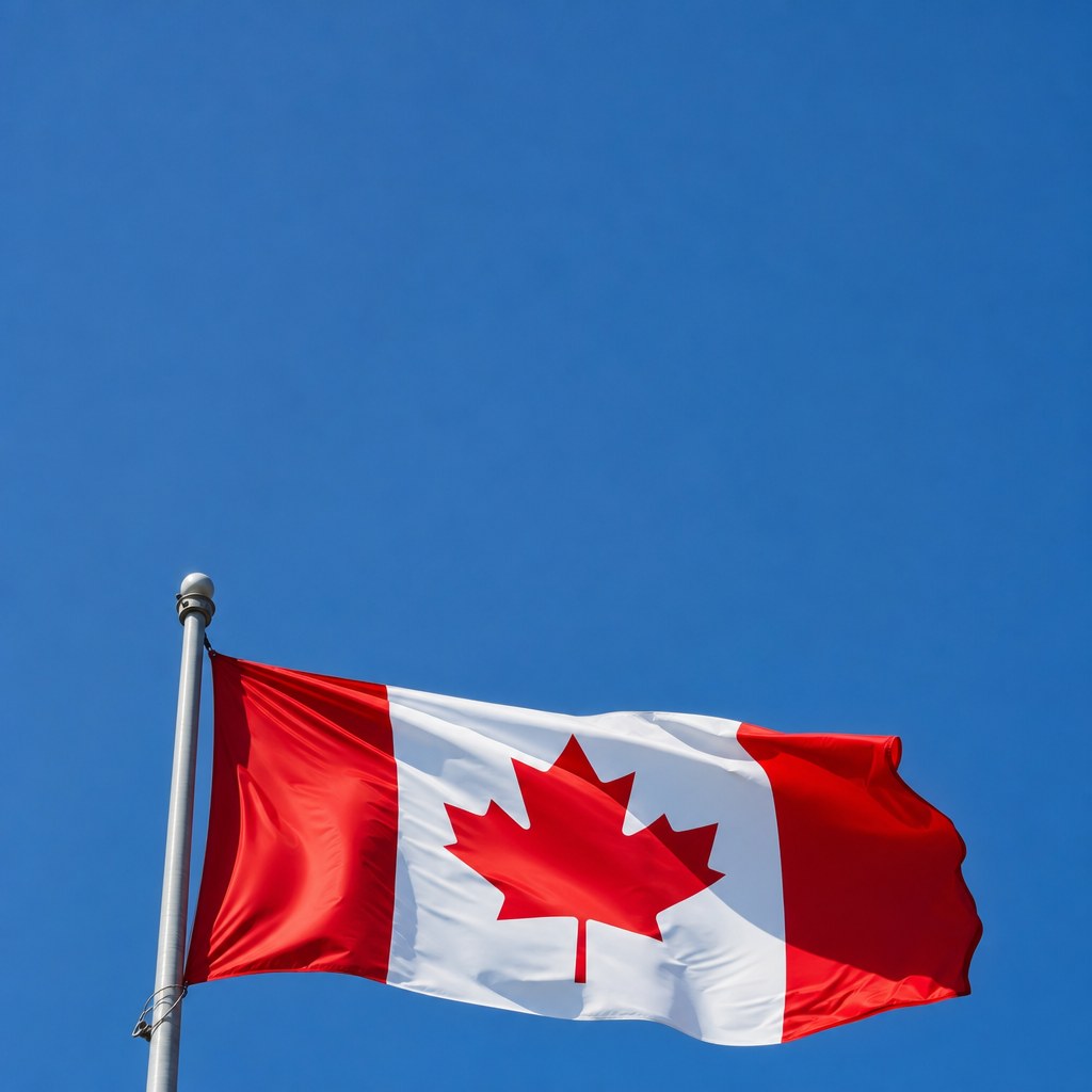 Canadian flag waving on a flagpole
